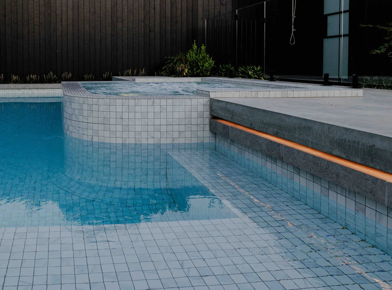 Pascoe Vale curved concrete pool and raised spa by Fine Art Pools