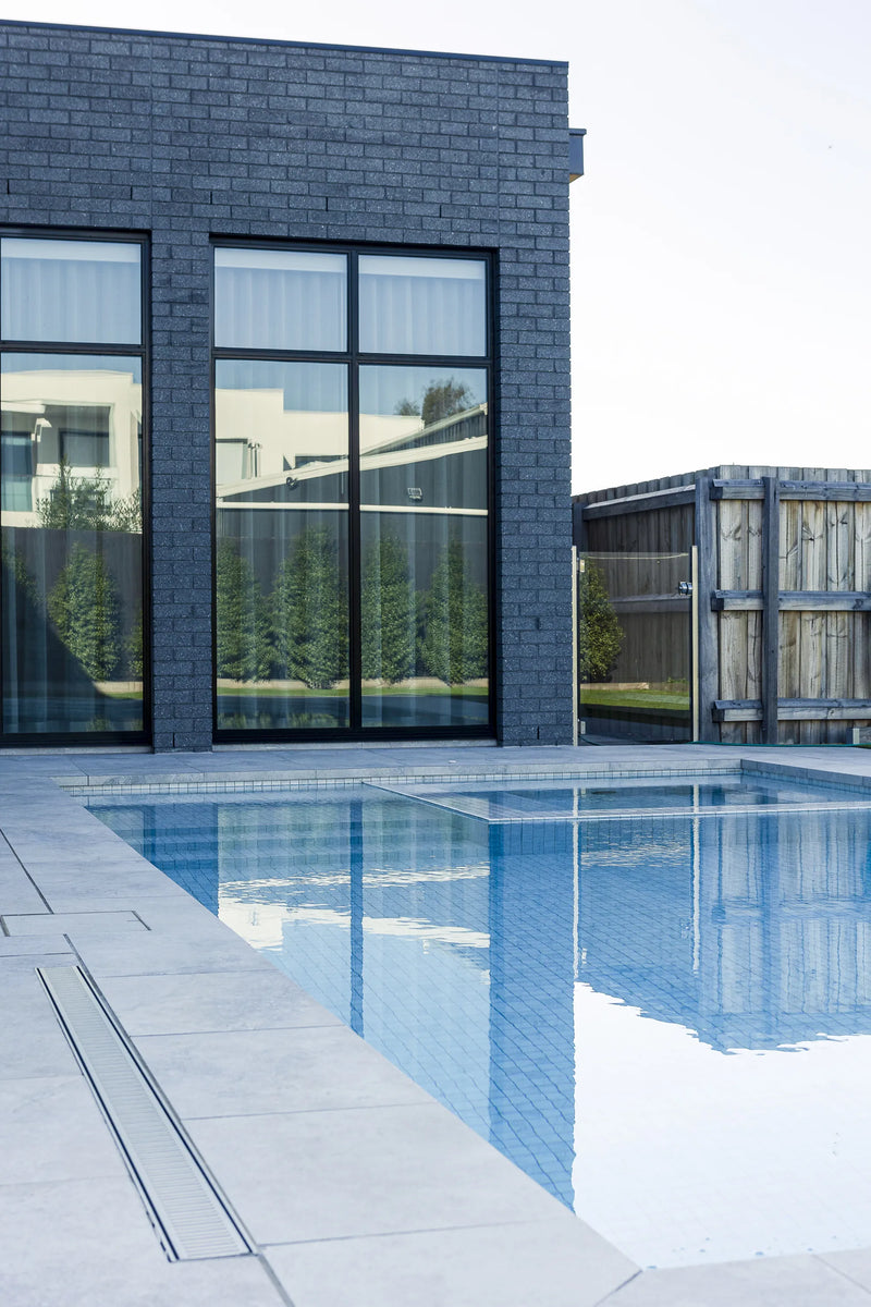 Integrated square spa with glass mosaic tiling in Altona pool by Fine Art Pools
