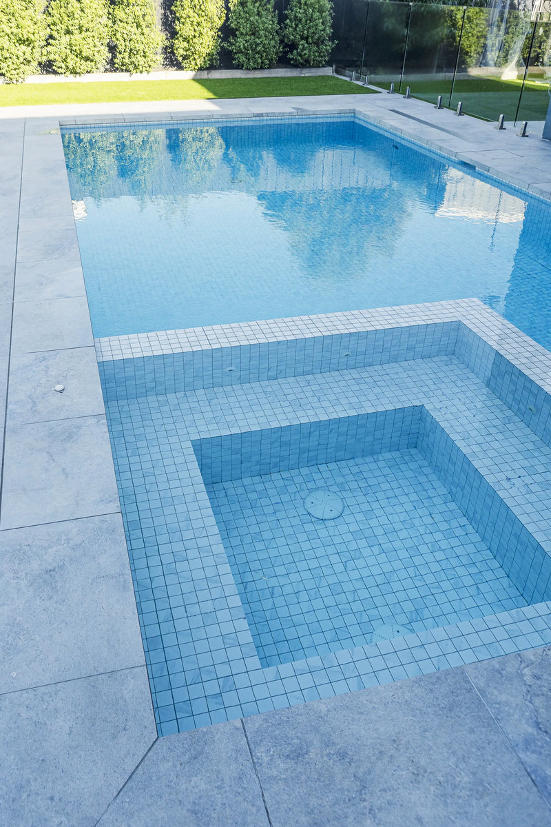 Altona concrete pool and spa combination with frameless glass fencing by Fine Art Pools