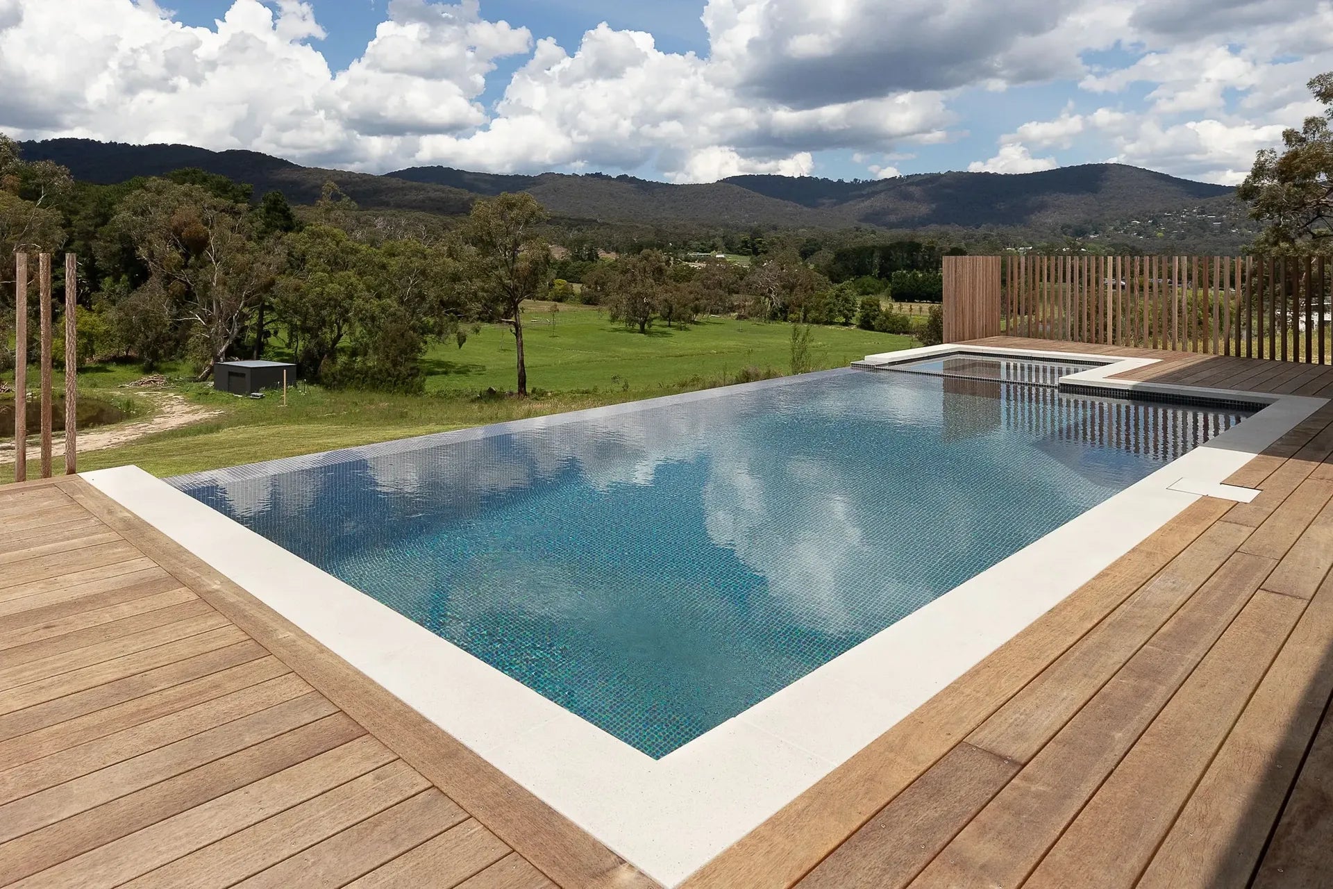 Kilsyth infinity edge concrete pool and spa by Fine Art Pools