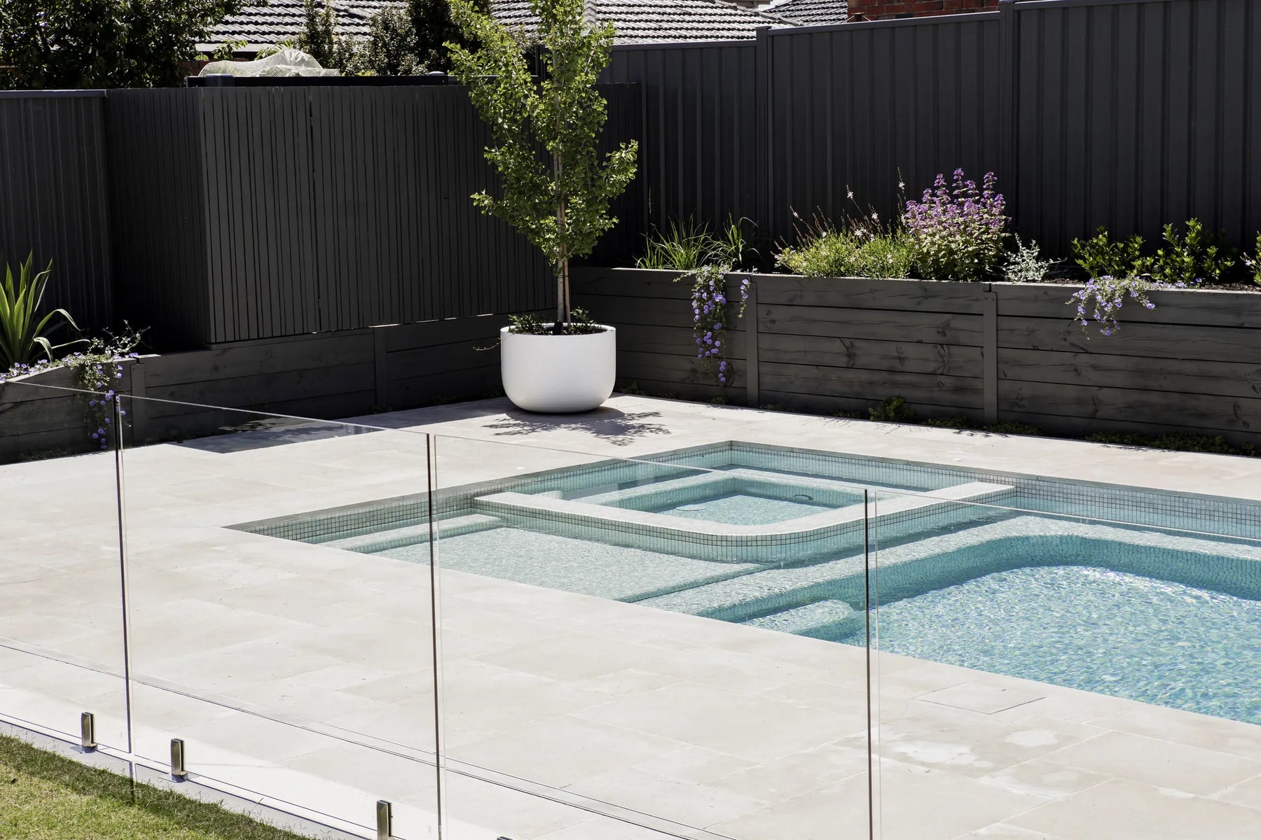 Preston concrete pool and spa combination by Fine Art Pools