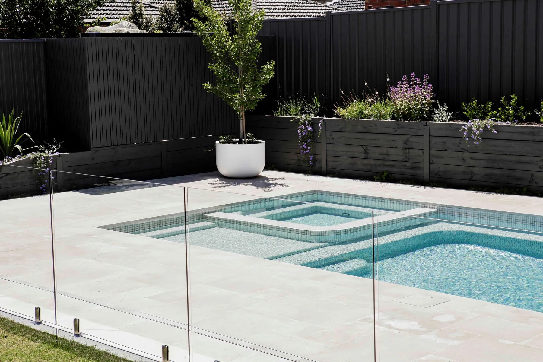 Preston concrete pool and spa combination by Fine Art Pools